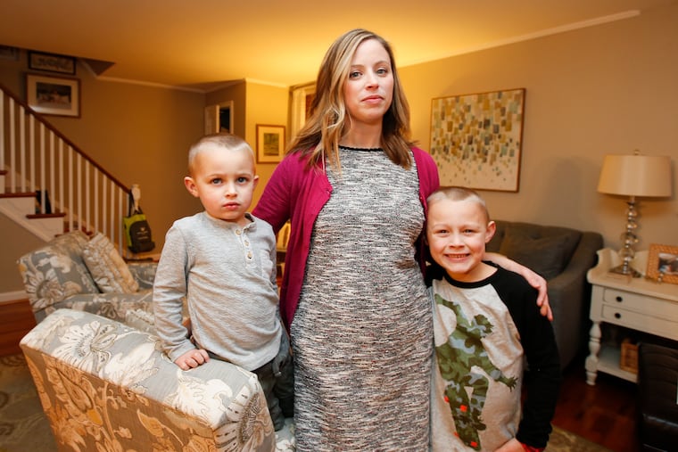 Allyson Groff with her sons, Owen, 7, (right) and Rhys, 3 inside their Havertown home on Thursday, Jan. 24, 2019. Allyson is a parent whose two children utilize Family Support Services, which provides child care to Haverford School District. If FSS leaves the district, she will have to scramble to find care.