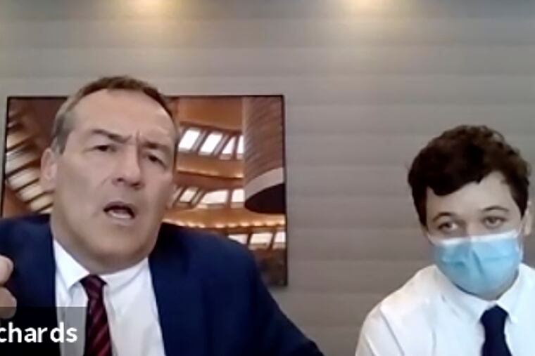 In this screen grab from live stream video, Attorney Mark Richards, left, with his client Kyle Rittenhouse, speaking during an arrest hearing in Kenosha County Court in Kenosha, Wis., on Feb. 11.