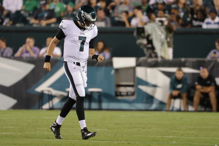 Eagles quarterback Nate Sudfeld walks off the field after injuring his wrist late in the second quarter of Thursday night's preseason game against Tennessee.