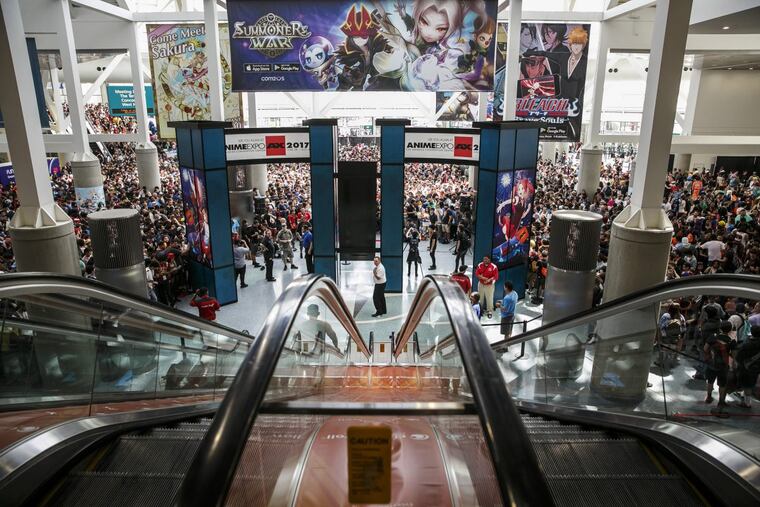 A huge crowd awaits the opening of the Anime Expo 2016, in Los Angeles, Calif.