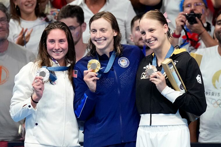 Gold medalist Katie Ledecky, with silver medalist Anastasiia Kirpichnikova of France (left) and bronze medalist Isabel Gose of Germany, won the 1,500 by more than 10 seconds. She’s expressed interest in competing in the 2028 Olympics on her home soil.