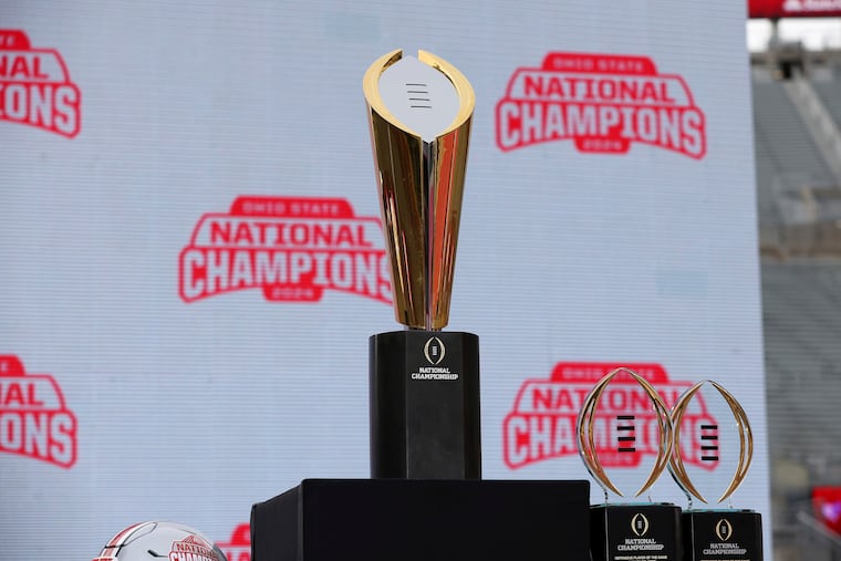The College Football Playoff National Championship Trophy on display in Columbus, Ohio, on Jan. 26.