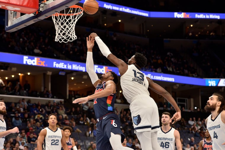 Memphis Grizzlies forward Jaren Jackson Jr. (13) blocks a shot by 76ers forward Tobias Harris (12) on Monday in Memphis, Tenn. (AP Photo/Brandon Dill)