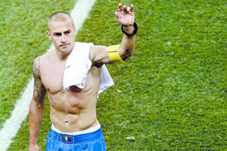 Italy's Fabio Cannavaro waves as he leaves the pitch during the World Cup group F soccer match between Italy and New Zealand at Mbombela Stadium in Nelspruit, South Africa, Sunday, June 20, 2010. (AP Photo/Michael Sohn)