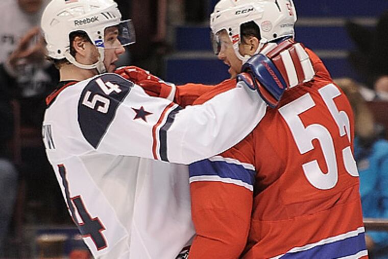 Cherry Hill native Bobby Ryan (left) helped the U.S. rout Norway, 6-1, at Canada Hockey Place. (Clem Murray/Staff Photographer)