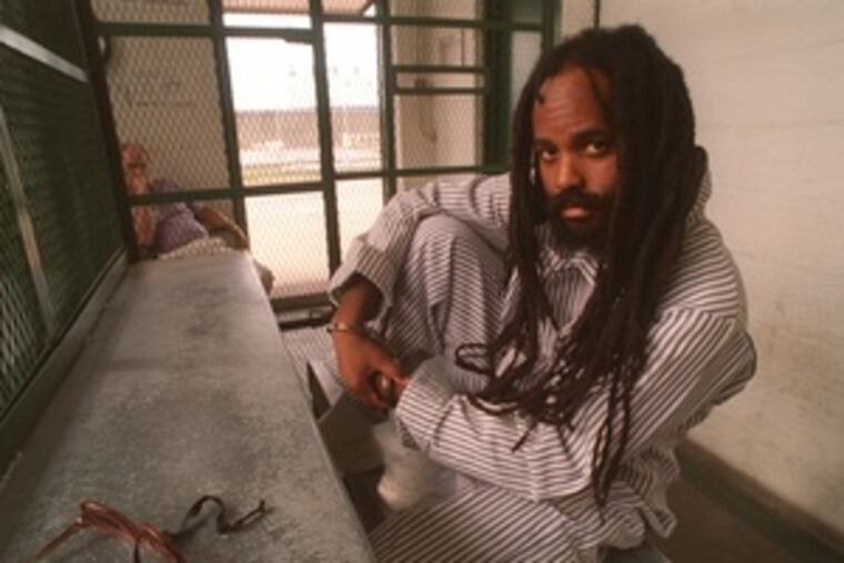 Mumia Abu-Jamal's guilty conviction was upheld again yesterday, but a federal appeals court questioned the death sentence.