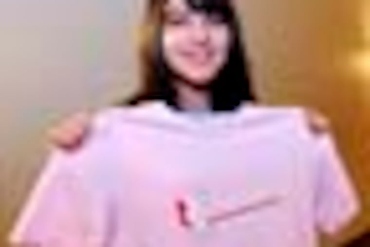 Samantha Pawlucy, 16, of Port Richmond, was asked to leave geometry class at Charles Carroll High School in Philadelphia, because she was wearing this Romney t-shirt .( SHARON GEKOSKI-KIMMEL / Staff Photographer ) Editors Note: Photo shot October 3, 2012 . RRXROMNEY04