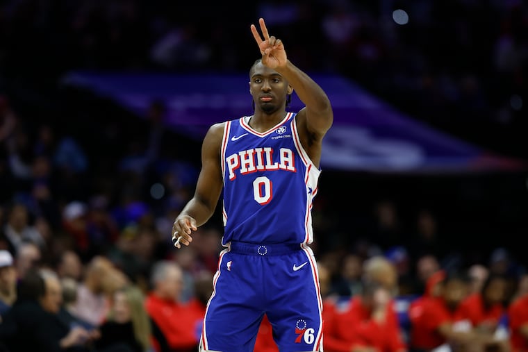 Sixers guard Tyrese Maxey shows off the price of tickets to Monday night's game against the Bulls.