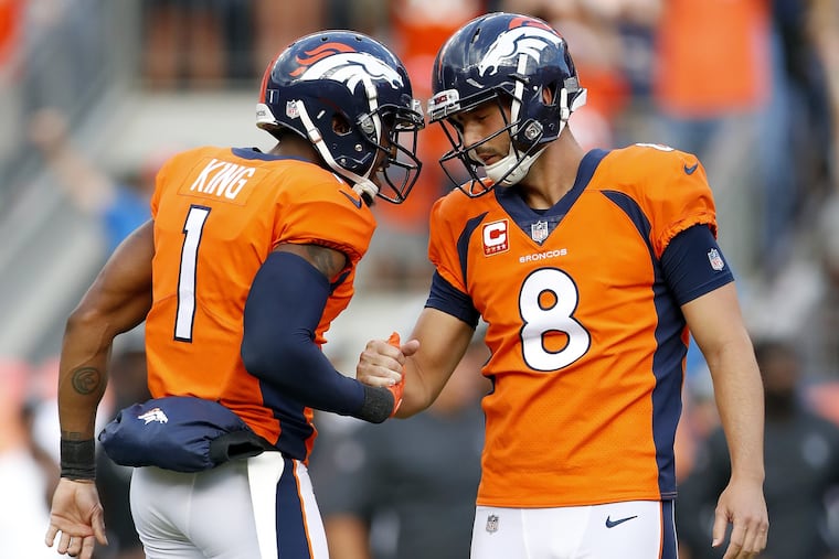 Brandon McManus (right) celebrates the game-winning field goal with punter Marquette King (1) that has ignited a controversy with FanDuel sports.