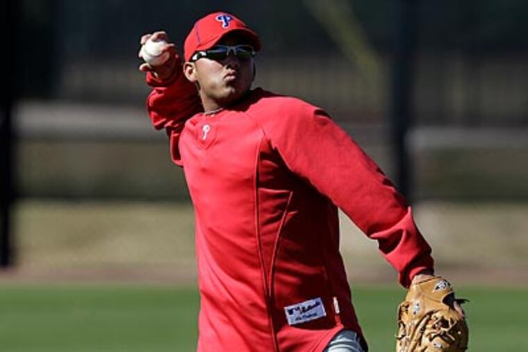 Phillies prospect Freddy Galvis was named to the 40-man roster. (Eric Gay/AP)