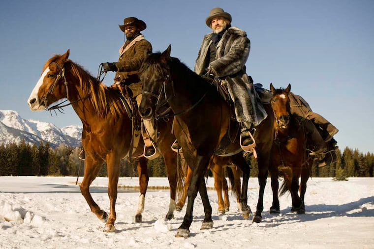 Quentin Tarantino's "Django Unchained" has a lot in common with the director's "Inglourious Basterds," including Christoph Waltz (right), this time as a bounty hunter, costarring with Jamie Foxx.