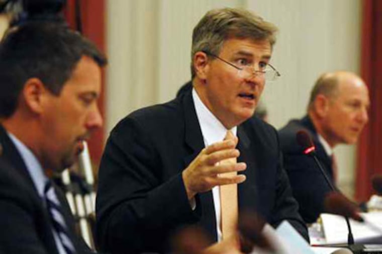 New Jersey Education Commissioner Bret Schundler answering questions during an Assembly Budget Committee hearing. (file photo)