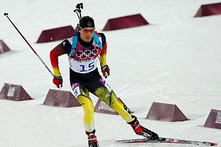 Germany's Simon Schempp competes during the men's biathlon 12.5k pursuit. (Felipe Dana/AP)
