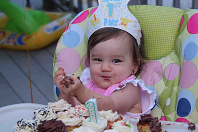 Mila Gefroh revels in birthday cupcakes . When it comes to healthful eating, her parents aren't fanatical - just sensible.