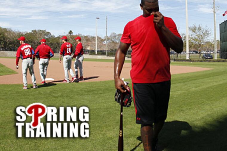 Ryan Howard is back in camp and wearing a boot. (Yong Kim/Staff Photographer)