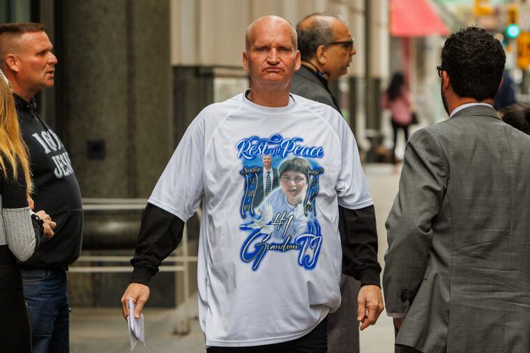 Thomas Lawler, grandfather of TJ Siderio, wears a T-shirt with his grandson's image outside the Juanita Kidd Stout Center for Criminal Justice on April 19, 2024.