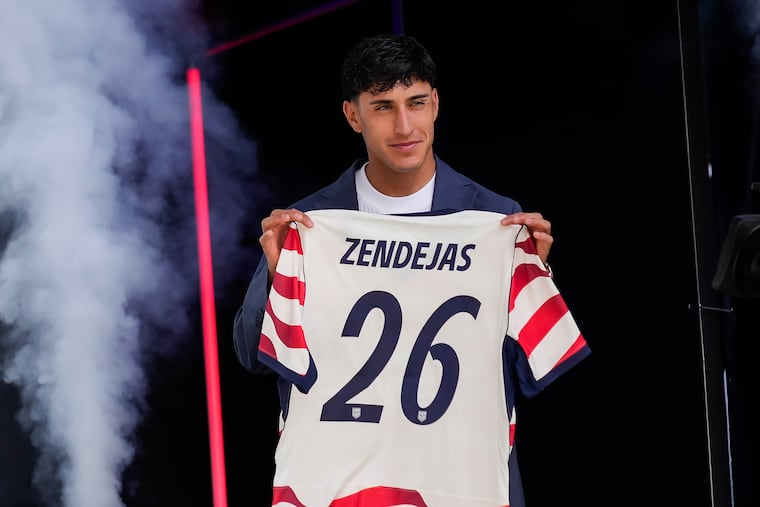 Alejandro Zendejas holds up his No. 26 jersey at the introduction of the U.S. World Cup team.