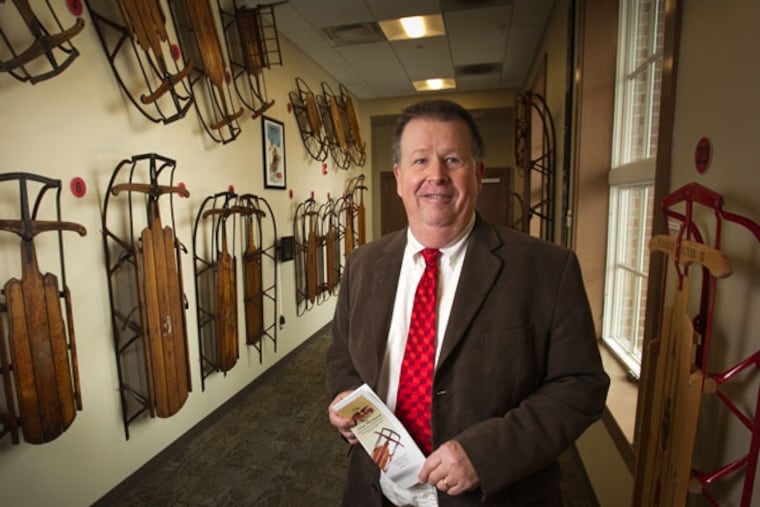 Joseph Galbraith of Moorestown Library at exhibit of Flexible Flyer sleds loaned by collector Philip Snow. (ALEJANDRO A. ALVAREZ / Staff Photographer)