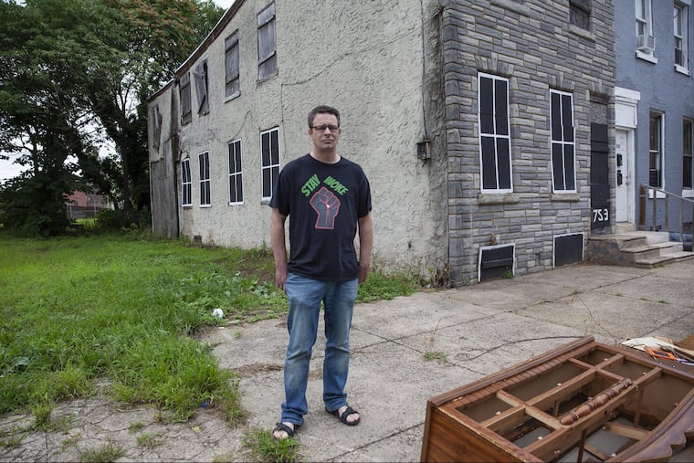 Patrick Duff, local social activist, outside the Camden home at 753 Walnut Street where the Rev. Dr. Martin Luther King Jr. lived as a young seminary student in 1950. HEATHER KHALIFA / Staff Photographer