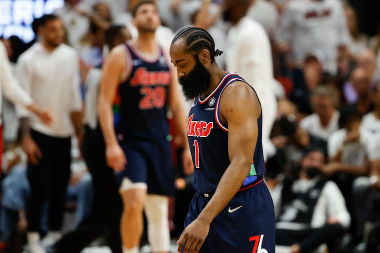 Sixers guard James Harden walks off the court during the fourth quarter against the Miami Heat.