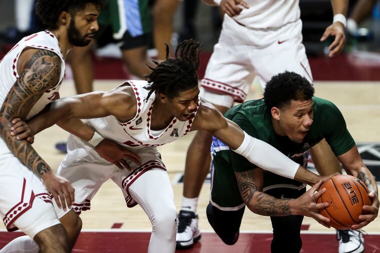 Guards Damian Dunn (left) and Khalif Battle say their plan is to work together to get Temple back on track and back into the NCAA Tournament conversation.