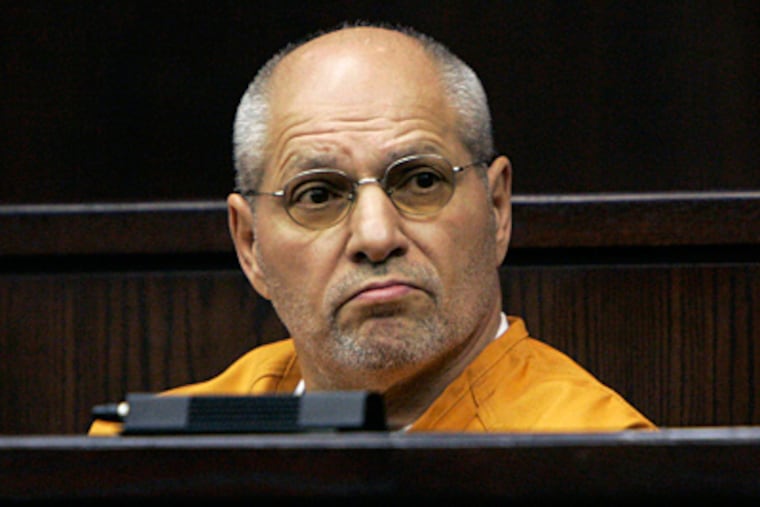 Michael Coppola, a reputed acting captain of the Genovese crime family, looks around the court in Somerville, N.J., in this March 2007 file photo. Coppola had eluded authorities since 1996. (AP Photo / Mike Derer, Pool)