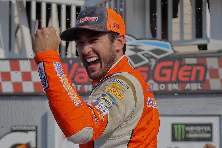 Chase Elliott celebrates after winning a NASCAR Cup Series auto race, Sunday, Aug. 5, 2018, in Watkins Glen, N.Y. (AP Photo/Julie Jacobson)