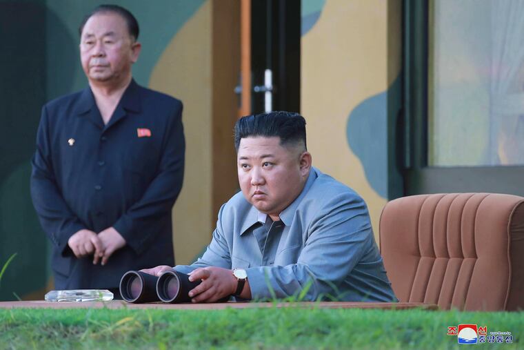 In this July 25, 2019, photo provided on Friday, July 26, 2019, by the North Korean government, North Korean leader Kim Jong Un watches a missile test in North Korea. North Korea on Saturday, Aug. 10, 2019, extended a recent streak of weapons display by firing projectiles twice into the sea, according to South Korea's military.
