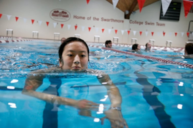 Demonstrating her swimming proficiency, Karen Shen sees if she can make it at Swarthmore, which, like Bryn Mawr, still requires a swim test. The Philadelphia student was among dozens who swam and treaded water for 15 minutes at the college pool. Bryn Mawr freshmen take the plunge today. Such exams, once common, are now rare. Story and more photos, A6.