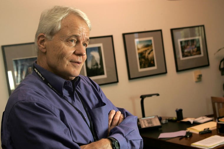 John Carroll is shown in 2005 in his office at the Los Angeles Times, where he was editor for five years.