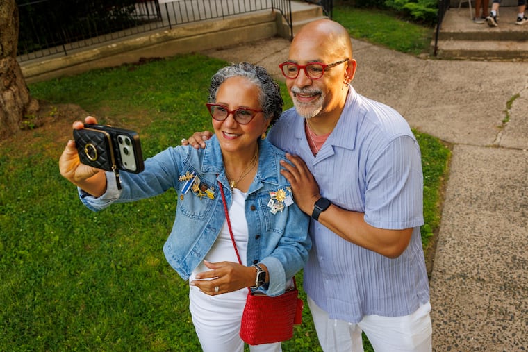 Chris Rabb, a candidate in Pennsylvania's 3rd Congressional District, takes a selfie with Laura Murphy, his aunt, after he cast his vote on election day at Grace Epiphany Episcopal Church, Philadelphia, Tuesday, May 19, 2026.