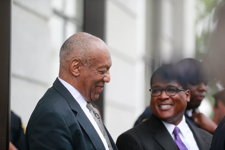 Bill Cosby leaves Montgomery County Courthouse with his spokesman Andrew Wyatt for the sixth day of deliberation after a mistrial was declared Saturday June 17th, 2017.