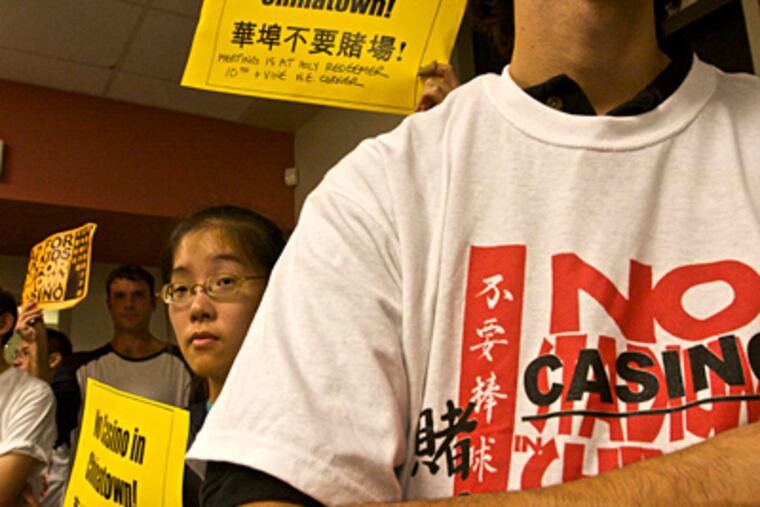 Residents of Chinatown rally against a plan for a casino in their neighborhood. (John Costello / Inquirer )
