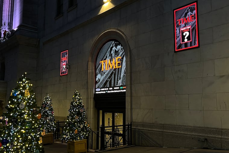 A sign for Time magazine is displayed outside the New York Stock Exchange on Thursday, Dec. 11.