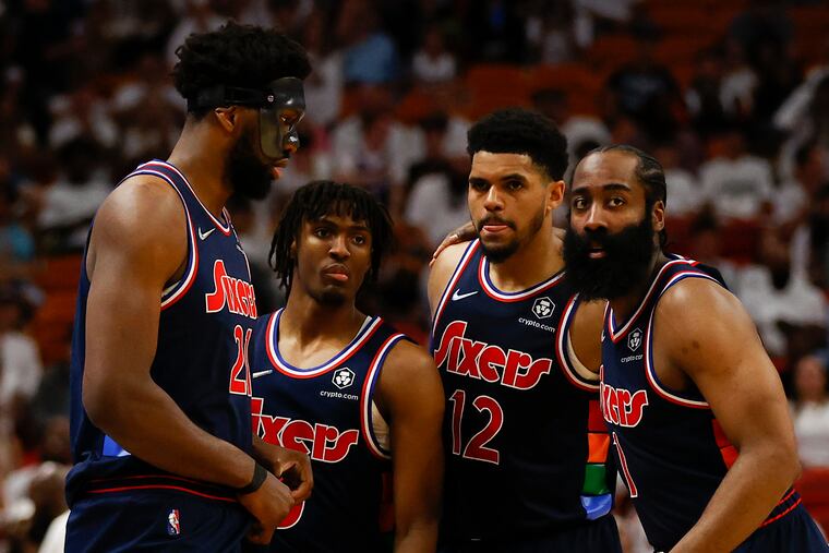 Sixers center Joel Embiid, guard Tyrese Maxey, forward Tobias Harris and guard James Harden gather before the start of the second half in game five of the second-round Eastern Conference playoffs on Tuesday, May 10, 2022 in Miami.