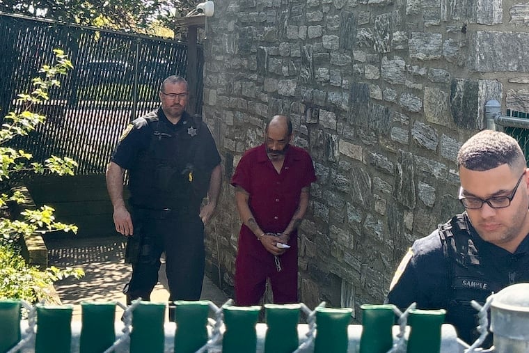Jose Luna is escorted out of district court in Rockledge after his preliminary hearing Thursday. Luna was held for court on murder and related charges in the death of his wife, Alisett Schubert.