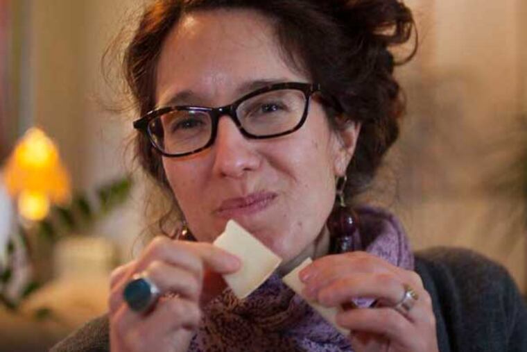 Tenaya Darlington samples goat cheese.
