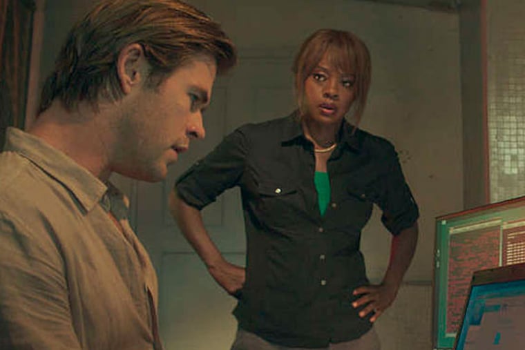 Chris Hemsworth, left, as Nicholas Hathaway, and Viola Davis, as FBI Special Agent Carol Barrett, in Legendaryís film, "Blackhat," from director/producer Michael Mann. (AP Photo/Legendary Pictures - Universal Pictures)