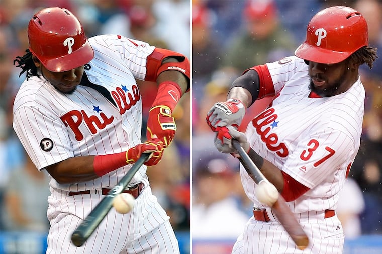 Phillies Maikel Franco (left) and Odubel Herrera at the plate.
