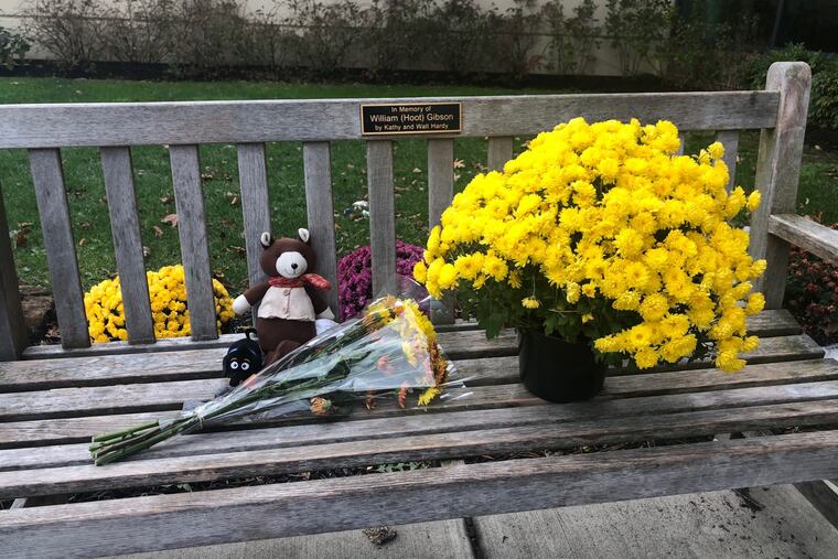 A small memorial rests on a bench outside of the Haverford Area YMCA, where a 2-year-old child was killed in the parking lot Saturday.