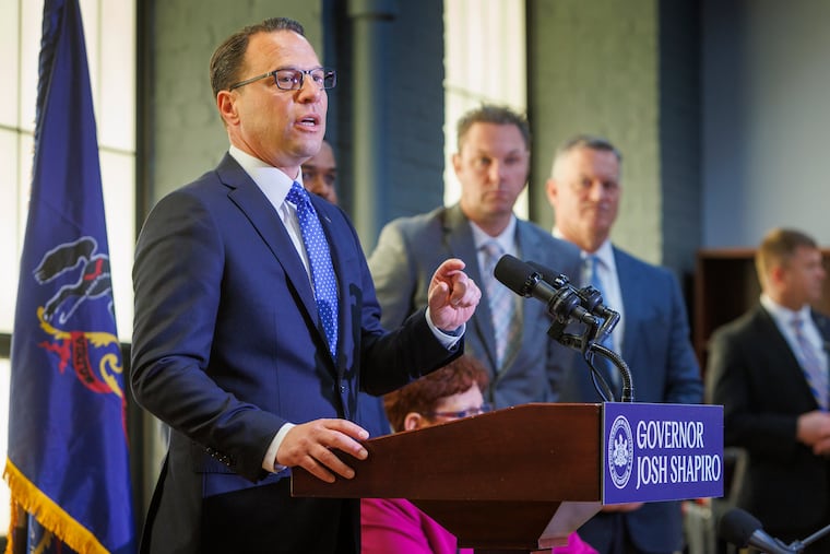 Pennsylvania Gov. Josh Shapiro speaking at a news conference at Impact Services in Philadelphia in April.