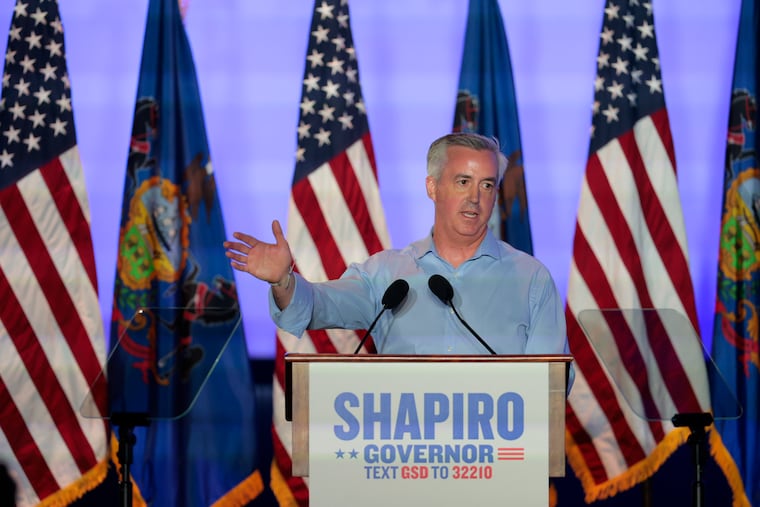 Bucks County Commissioner Bob Harvie addresses supporters during a primary election party in Warminster hosted by Gov. Josh Shapiro. Harvie will face U.S. Rep. Brian Fitzpatrick in the fall.