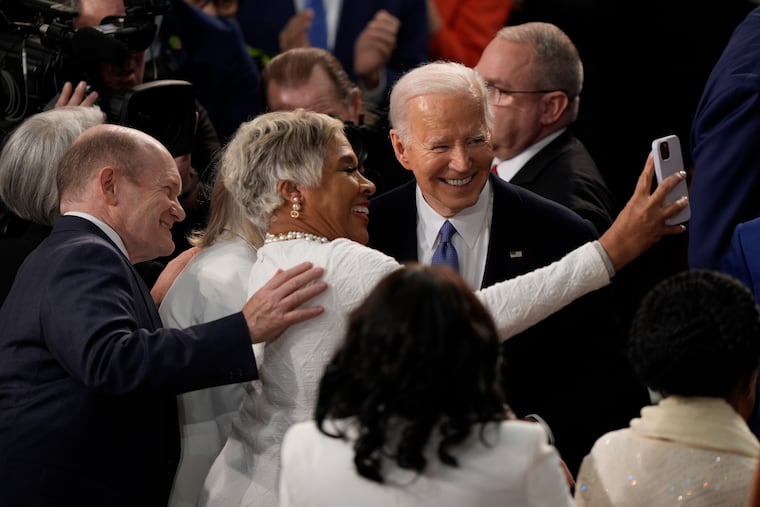 President Joe Biden takes a photo before he delivers the State of the Union address on Capitol Hill, Thursday, March 7, 2024, in Washington.