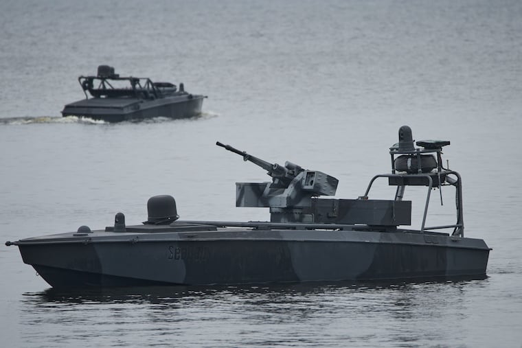 Sea Baby drones ride on the water during a demonstration by Ukraine's Security Service in an undisclosed location in Ukraine, Oct. 17, 2025.