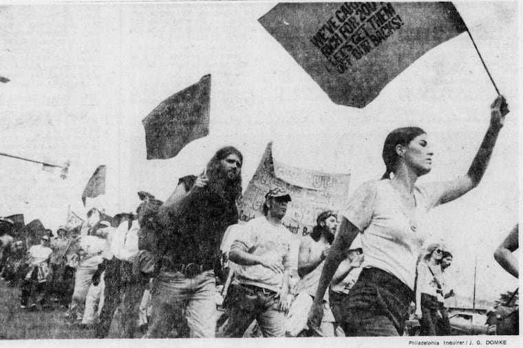 Marchers affiliated with Rich Off Our Backs demonstrate at 18th Street and Girard Avenue on July 4, 1976.