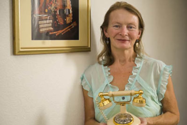 Dorothy Hawkinson of Sacramento, California, won't give up her classic rotary phone that she bought from a Pacific Bell store more than 25 years ago. She's also part of another rare group these days: people without a cell phone. Hawkinson said she dislikes the sound quality of cell phones and hard-to-read numbers. (Paul Kitagaki Jr. / Sacramento Bee / MCT)