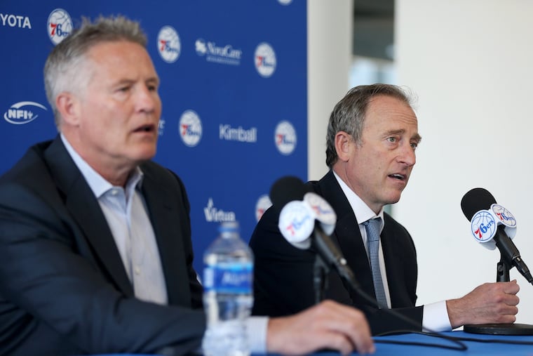 Sixers interim GM Brett Brown (left) and co-managing partner Josh Harris speak during a news conference discussing the resignation of Bryan Colangelo on Thursday at the team's facility it Camden, N.J.