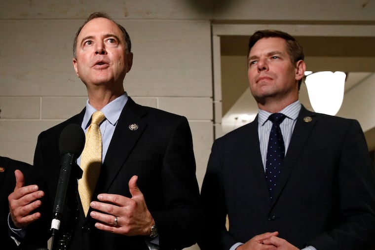 In this May 2019 photo, Rep. Adam Schiff, D-Calif. (left), and Rep. Eric Swalwell, D-Calif., spoke with members of the media on Capitol Hill in Washington.
