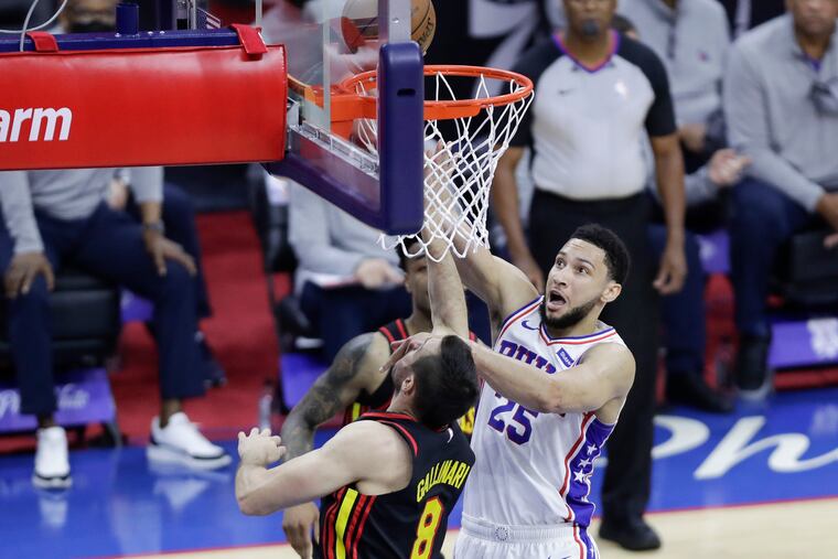 Sixers guard Ben Simmons attempts to lay-up against Atlanta Hawks forward Danilo Gallinari during the first quarter in Game 7 of the NBA Eastern Conference playoff semifinals on Sunday, June 20, 2021 in Philadelphia.