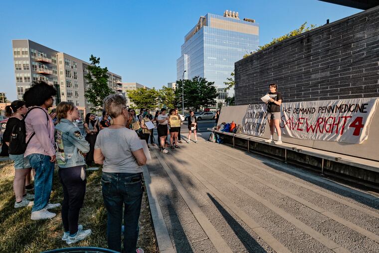 Lily Hamilton with the Community Action Relief Project protests the closure of Wright 4, an addiction treatment center in Penn Presbyterian Medical Center, saying the move will limit options for people with addiction in West Philadelphia.